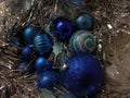 Blue  Christmas balls lying on silver tinsel Royalty Free Stock Photo