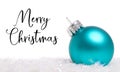 A blue Christmas bauble, ball or decoration on white background Royalty Free Stock Photo