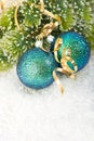 Blue christmas bauble with christmas tree branch Royalty Free Stock Photo