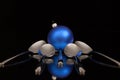 Blue Christmas decoration and five spoons