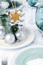 Blue christmas dinner table setting with glass dome centerpiece Royalty Free Stock Photo