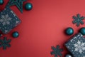 Blue Christmas Gift Boxes and Ornaments on Red Holiday Background Royalty Free Stock Photo