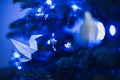 Blue Christmas lights white origami baubles