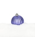 Blue Christmas New Year sphere, ball lying on the white snow Royalty Free Stock Photo