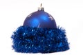 Blue Christmas tinsel with Christmas balls on a white background Royalty Free Stock Photo