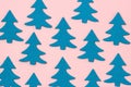 Blue Christmas Tree on Light Pink Background Top View Flat Lay Christmas Card or Background Minumal Concept Holiday Concept