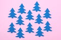 Blue Christmas Tree on Light Pink Background Top View Flat Lay Christmas Card or Background Minumal Concept Holiday Concept