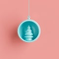Blue Christmas tree ornament in blue glass on pastel pink background