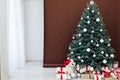 Blue Christmas tree pine decor for new year brown background postcard interior