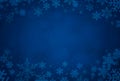 Blue Christmas winter background with snowflakes