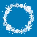 Blue Christmas winter background with snowflakes wreath