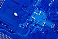 Blue circuit board background of computer motherboard,Electronic computer hardware technology.Integrated communication processor. Royalty Free Stock Photo