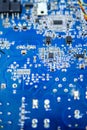 Blue circuit board close-up with microelements different shapes Royalty Free Stock Photo