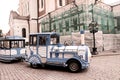 Blue City Train, tourist sightseeing vehicle, is driven through steet near Alexander Nevsky Cathedral in the Old Town of Tallinn