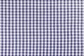 Blue classic checkered tablecloth texture, background with copy space. Royalty Free Stock Photo