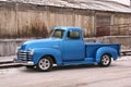 Blue classic pickup with contrasting background Royalty Free Stock Photo