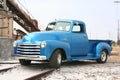 Blue classic pickup on train track Royalty Free Stock Photo