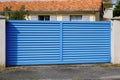 Blue classic portal sliding modern house gate door to access garage home garden