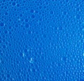 Blue clean water drop bubbles close-up background Royalty Free Stock Photo