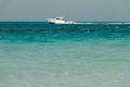 Blue clear sea, yacht, water, waves, clear sky. beach in Saadiyat island, United Arab Emirates. Beautiful seascape