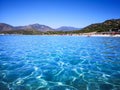 The blue clear water and white sand of a beach in Sardinia Royalty Free Stock Photo