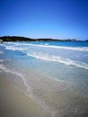 The blue clear water and white sand of a beach in Sardinia Royalty Free Stock Photo