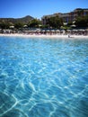 The blue clear water and white sand of a beach in Sardinia Royalty Free Stock Photo