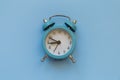 Alarm clock isolated on blue background with copy space Royalty Free Stock Photo