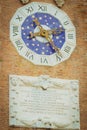 Blue clock on the wall of The Venetian Arsenal, Italy, vertical
