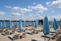 Blue closed stationary beach umbrellas Royalty Free Stock Photo