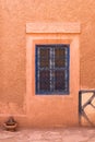 Blue closed window in traditional moroccan house. Arabic style in architecture. Royalty Free Stock Photo