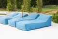 Blue cloth bed for sunbathing Royalty Free Stock Photo
