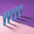 Blue clothespins on a pink purple background. Modern conceptual art.