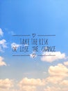 Blue cloud background with motivational writing quote & x22;Take the risk, Or Lose the Chance& x22;