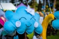 Blue cloud-shaped pillow with a sleeping smiling face, children`s sleep Royalty Free Stock Photo