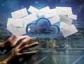 Blue cloud surrounded by realistic envelope email displayed on a Royalty Free Stock Photo
