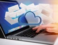Blue cloud surrounded by realistic envelope email displayed on a Royalty Free Stock Photo