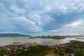 Blue clouds and sky over small village Coron at Royalty Free Stock Photo