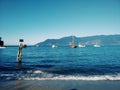 Blue coast with boats in Brazil