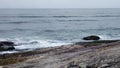 Blue sea with waves and rocks