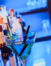 Blue cocktail drink on a bar table Royalty Free Stock Photo