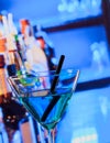 Blue cocktail drink on a bar table Royalty Free Stock Photo