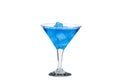 Blue cocktail in a glass for martini with ice isolated on a white background. Blue cocktail with martini on a white background. Royalty Free Stock Photo