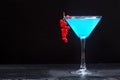 Blue cocktail with red currant Royalty Free Stock Photo