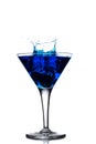 Blue cocktail splash in martini glass Royalty Free Stock Photo