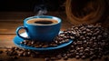 A blue coffee cup full of black coffee on a wood background with coffee beans Royalty Free Stock Photo
