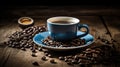 A blue coffee cup full of black coffee on a wood background with coffee beans Royalty Free Stock Photo