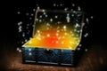 Blue coffer with orange gleam and sparkling lights Royalty Free Stock Photo