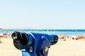 Blue Coin Operated Telescope With Beach And Ocean Royalty Free Stock Photo