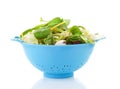 Blue colander with fresh lettuce